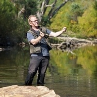 Alfred Pizzini fly fishing on the King River